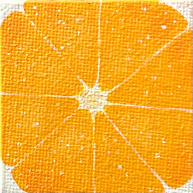 Amber Peeks Art: close-up image of an orange painted on a miniature canvas magnet created by Atlanta multi-disciplinary visual artist Amber Peeks.