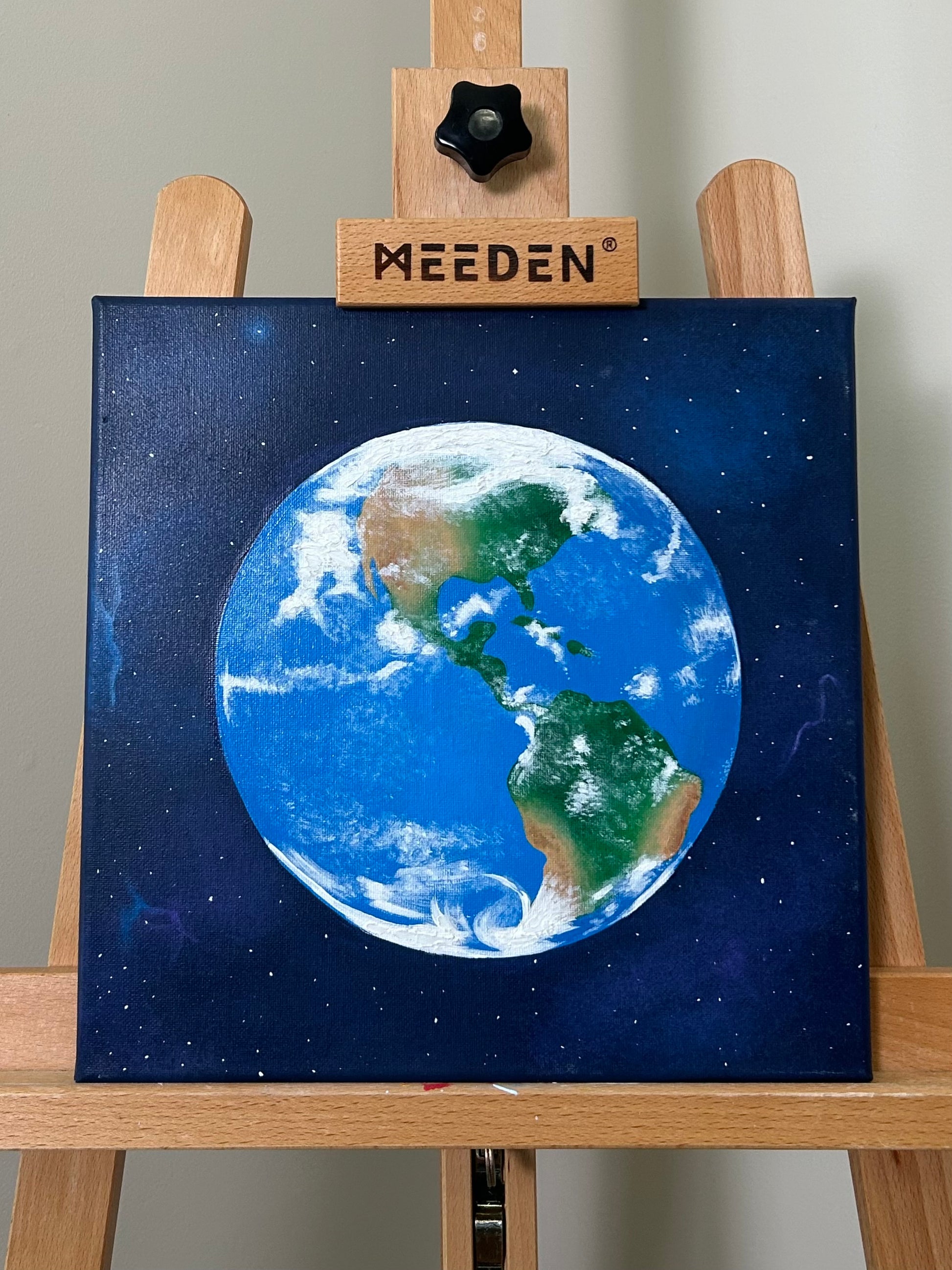 Amber Peeks Art: Original, 3D, mixed media painting of planet Earth in space created by Atlanta multi-disciplinary visual artist Amber Peeks