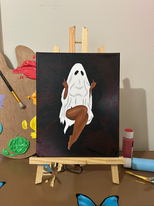 Amber Peeks Art: Painting of a ghost with brown body on a black background, displayed on an easel with art supplies.