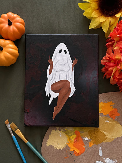 Amber Peeks Art: Canvas with ghost painting surrounded by pumpkins and sunflowers on a dark surface