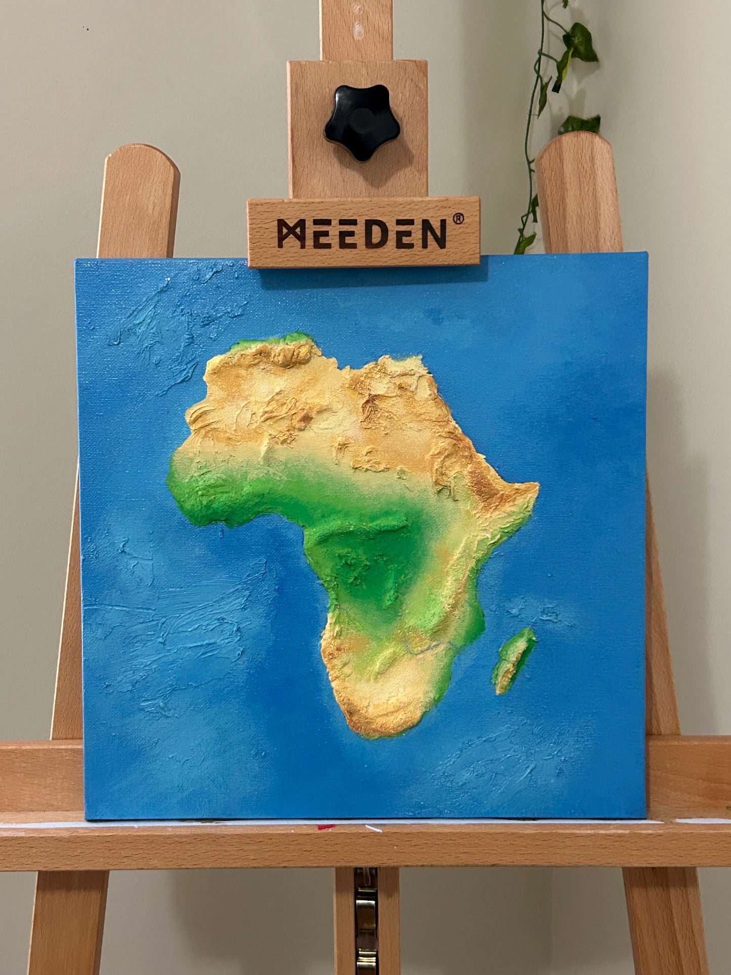 Amber Peeks Art: 3D painting of Africa on a wooden easel
