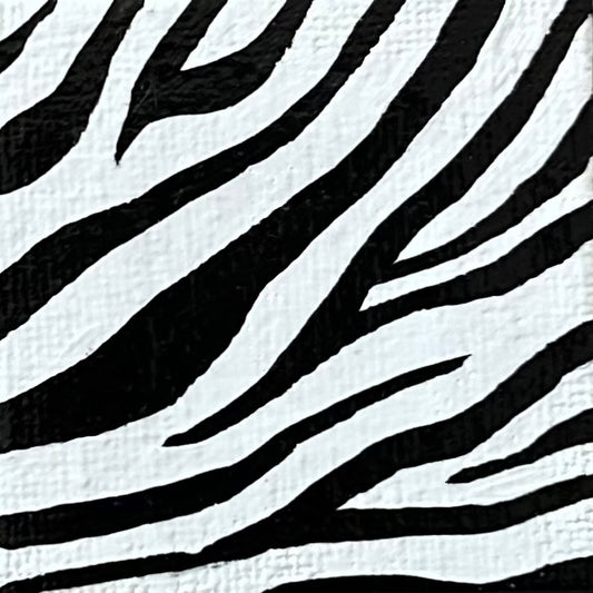 Amber Peeks Art: close-up image of zebra print painted on a miniature canvas magnet created by Atlanta multi-disciplinary visual artist Amber Peeks.